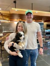 Puppy parent with Mini Bernedoodle